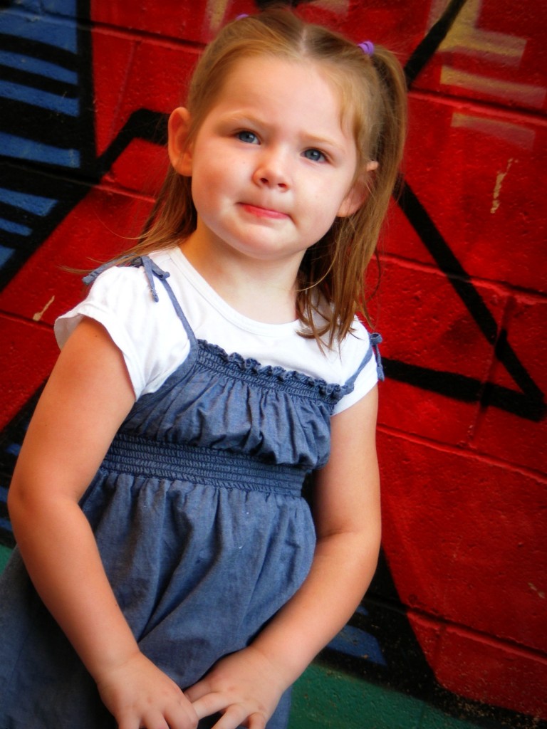 Emily by red wall